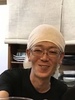 谷 覚広 氏