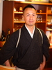 関 謙三 氏