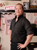 久保 栄二 氏